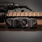 Alternate in-use view of the Unity AXON™ SL M-LOK Mounting Kit (Black) with AXON SL remote attached on an M-LOK handguard, showing secure low-profile fit and minimal footprint. Engineered for snag-free operation and reliable remote switching during dynamic tactical movement.