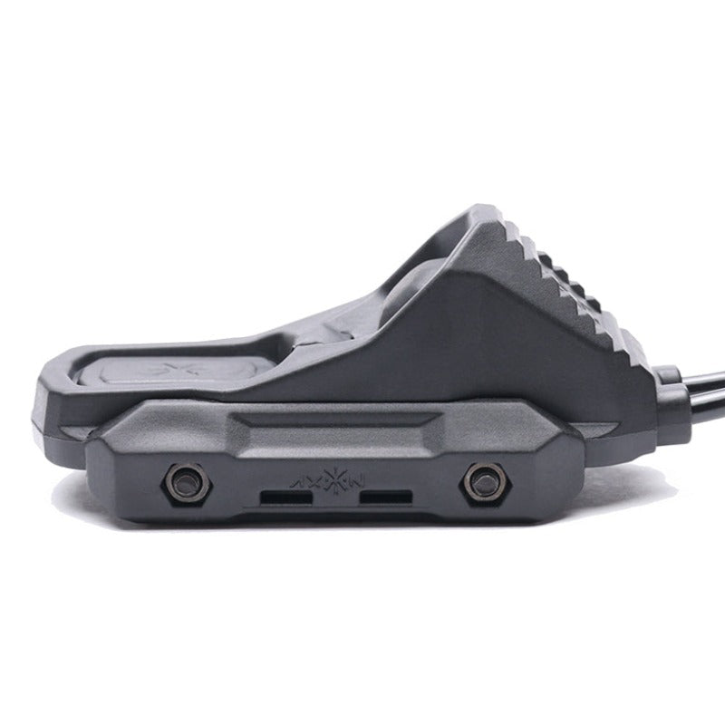 Unity AXON SYNC black remote switch showing cable routing and rail clamp design for tactical rifle setup