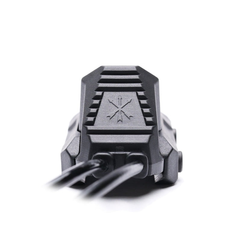 Unity AXON SYNC switch mounted on Picatinny rail showing flat and angled buttons for light and laser