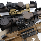 Unity FAST LPVO Scope Mounts installed on multiple rifles | 2.05" optic mounts for 30mm and 34mm LPVO scopes, geared tactical loadout ready for NVG and accessories