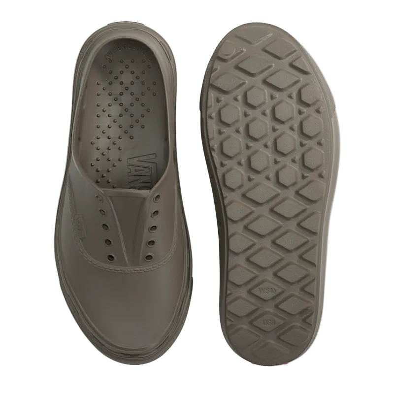 Gray slip-on shoe with textured sole on a light gray background