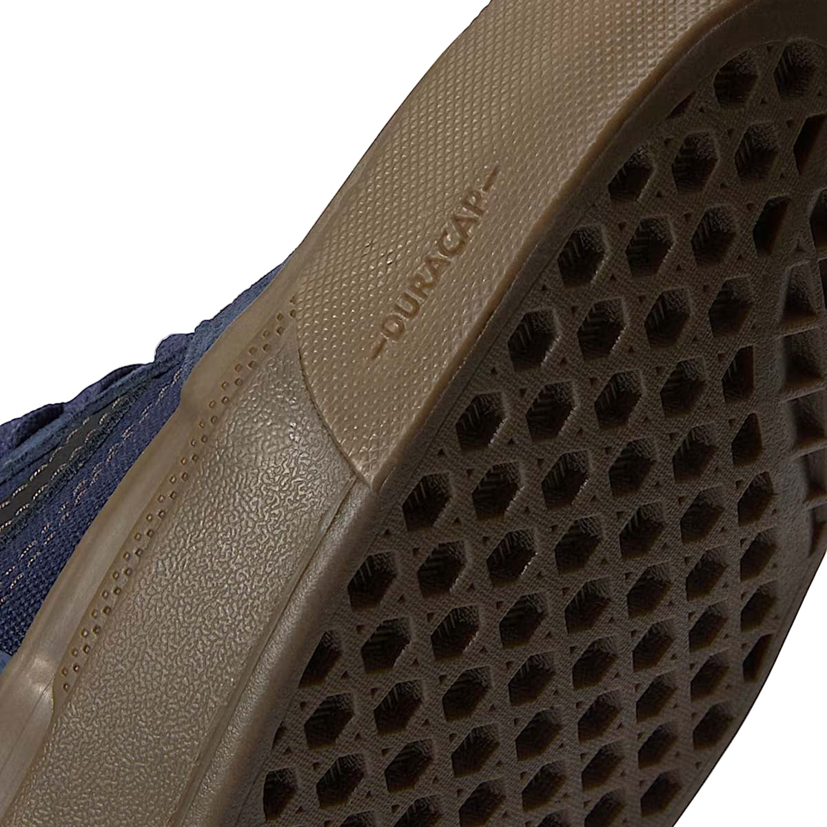 Detail shot of the Vans BMX Old Skool Parisian Night shoes highlighting the gum rubber Wafflecup™ sole with VDFPR tread for pedal grip and the DURACAP™ underlay reinforcements in high-wear areas, built for BMX and MTB flat pedal durability and performance.