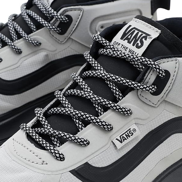 Close-up of the Vans Crosspath Mid Shoe showing the lace system, reinforced eyelets, and durable upper construction.