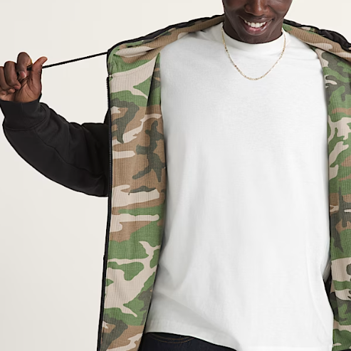 Vans Dover Thermal Zip Hoodie featuring midweight black fleece and thermal camo print inside with embroidered patch and full-zip closure for tactical comfor