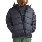 On body view of the Vans Hillgate Puffer Jacket in Black showing the hooded 10 oz insulated design with recycled polyester shell built for cold weather, range days, and outdoor travel.
