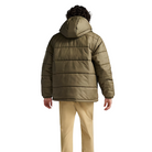 Back view of the Vans Hillgate Puffer Jacket in Bungee Cord brown being worn showing the hooded insulated 10 oz poly fill design with a recycled polyester shell built for cold weather comfort and outdoor use.