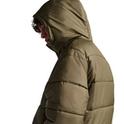 On body view of the Vans Hillgate Puffer Jacket in Bungee Cord brown with the hood up showing the insulated 10 oz poly fill design and recycled polyester shell built for cold weather protection and outdoor use.