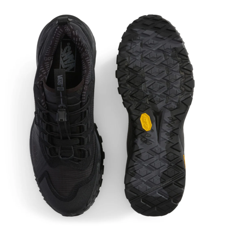 Top and outsole view of the Vans MTE Crosspath Black on Black displaying the lace system, footbed, and aggressive all-terrain tread pattern.