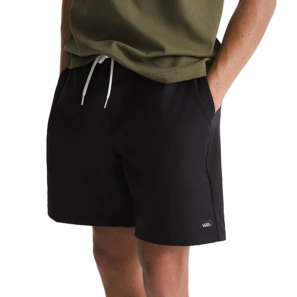 Model wearing Vans Range Sport Shorts in Black, highlighting the relaxed fit, lightweight performance fabric, and comfortable everyday versatility.