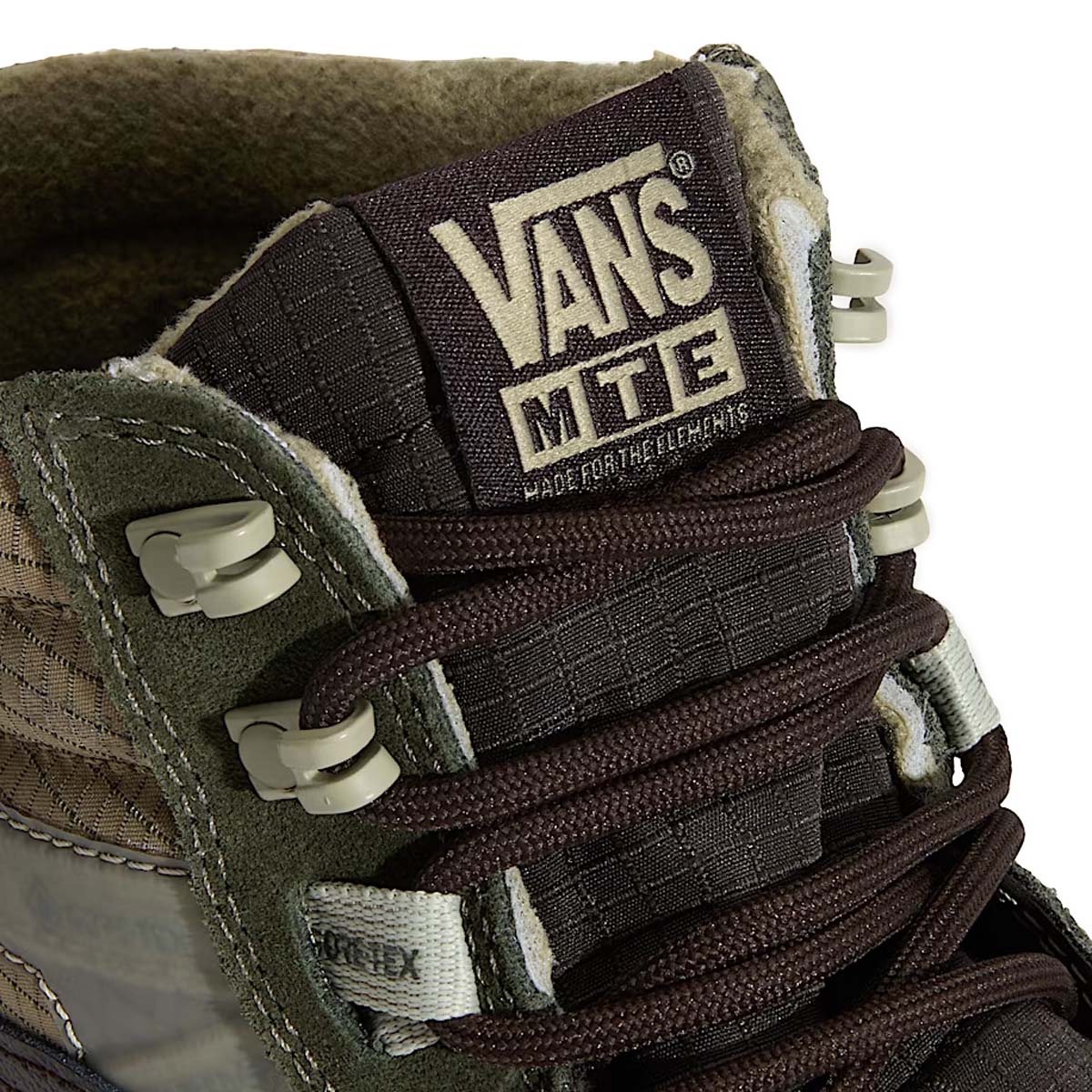 Close-up of the Vans Sk8-Hi GORE-TEX Insulated Shoe in Green Brown highlighting the lace system, durable materials, and MTE all-weather construction.