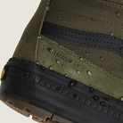 Close-up of HydroGuard® waterproof protection on olive green Vans Sk8-Hi Waterproof MTE, designed to keep feet dry and warm in rain, snow, or slush