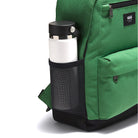 Close-up of the mesh water bottle holder on the Vans Startle Backpack in Pine Forest Green, designed for easy-access hydration on off-duty days and commutes