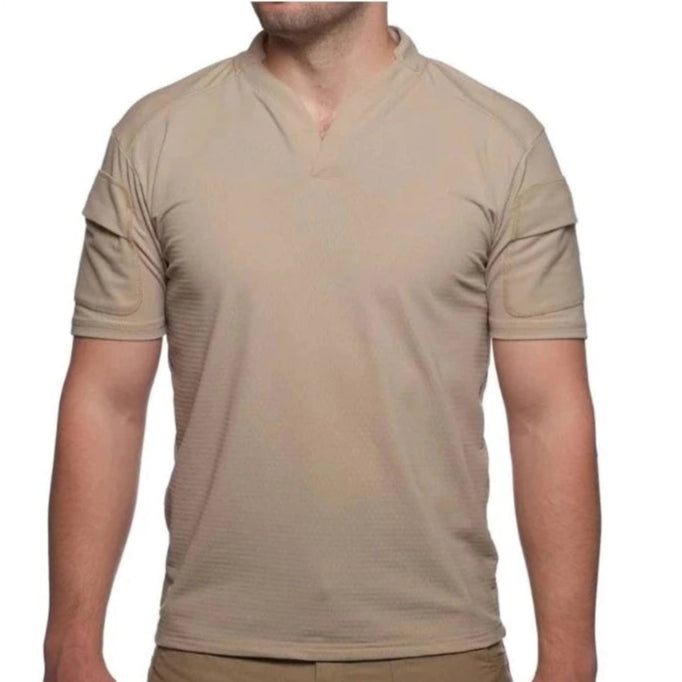 Front view of the Velocity Systems BOSS Rugby Short Sleeve Combat Shirt in Tan, a USA-made tactical range top built for sheriff and law enforcement use. Features 4-way stretch nylon-spandex, UV protection, and moisture-wicking tech for duty and training.