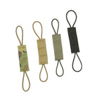 Velocity Systems Tourniquet Retainer shown in multiple colorways featuring a lightweight shock cord retention system for securing CAT tourniquets to MOLLE gear.