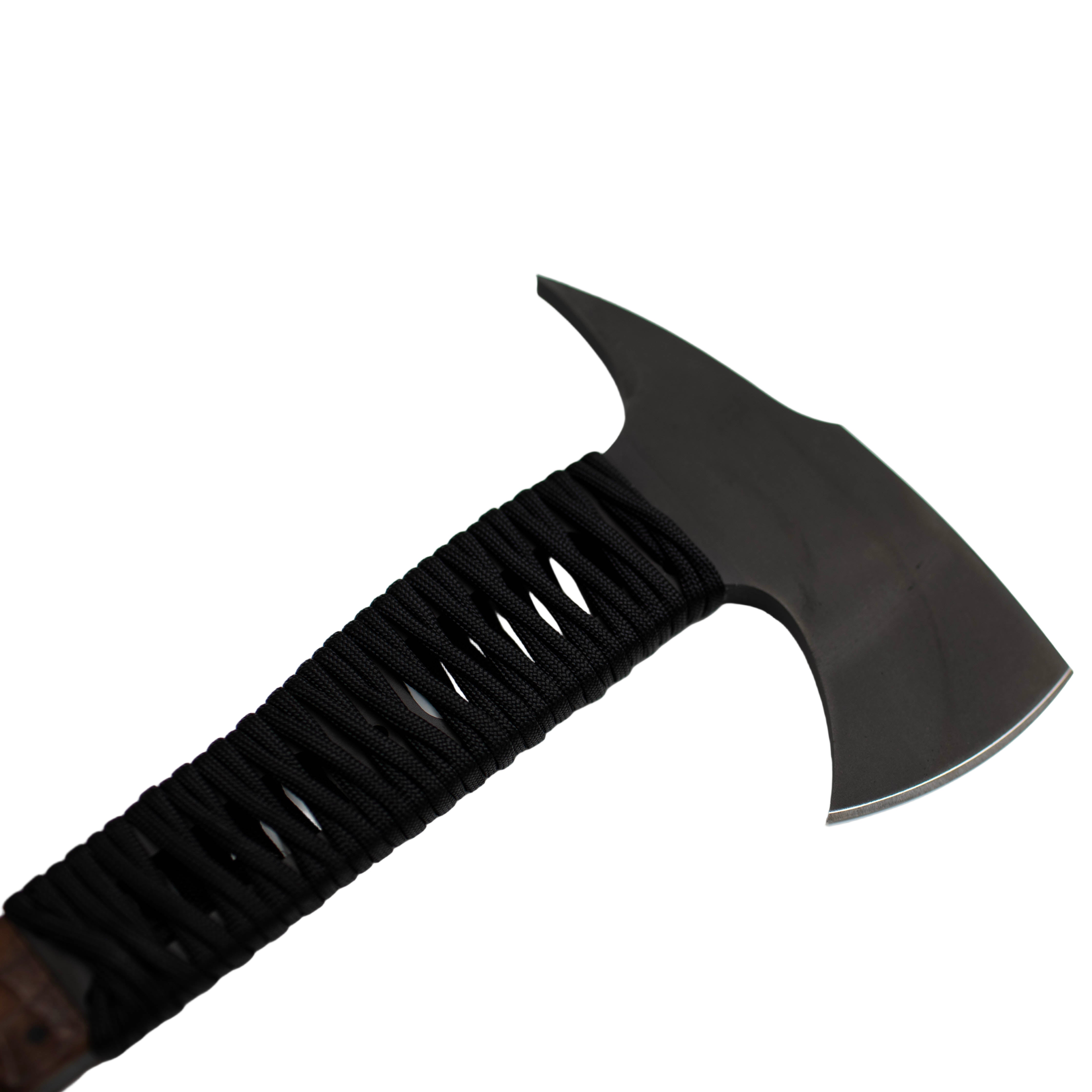 Side profile of the WK Combat Axe featuring a sculpted walnut cord handle, skeletonized tang, and aggressive spiked breaching head.