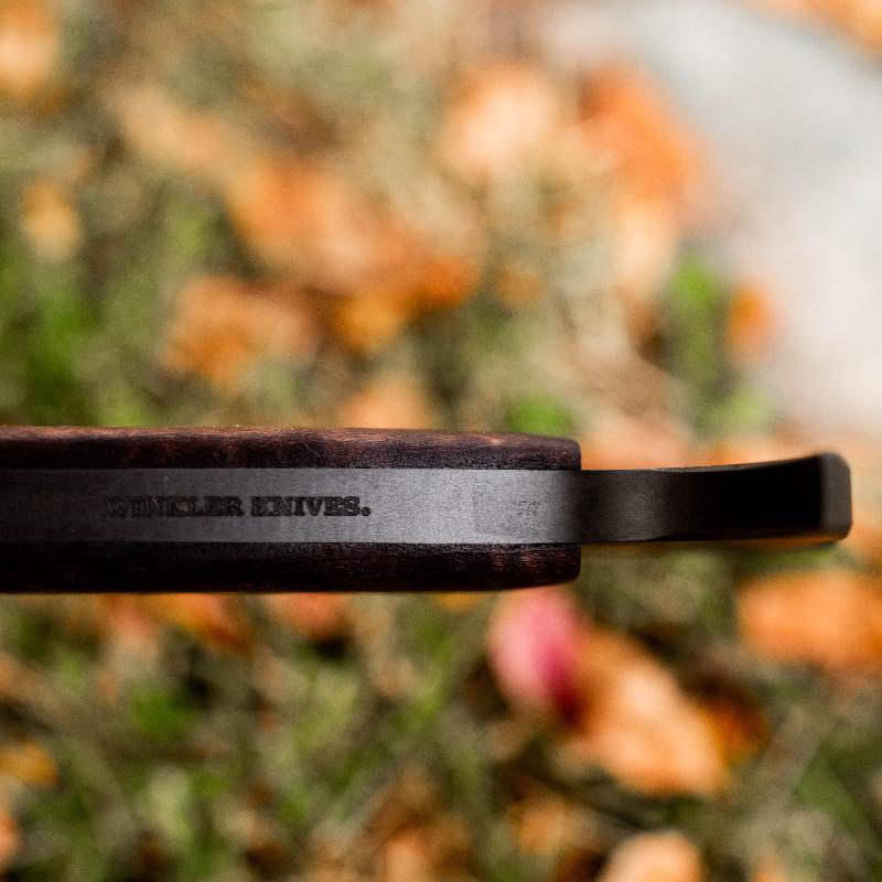 Spine view of Winkler Combat Axe maple version highlighting skeletonized full tapered tang for strength and reduced weight in combat applications