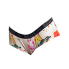 Front view of the Cheeky Tiki Women’s Battle Briefs featuring vibrant tropical graphics and a no-ride fit, made with breathable 4-way stretch fabric for athletic performance and everyday comfort.