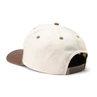 Beige cap with brown accents on a white background