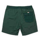 Green shorts with a pocket on a white background