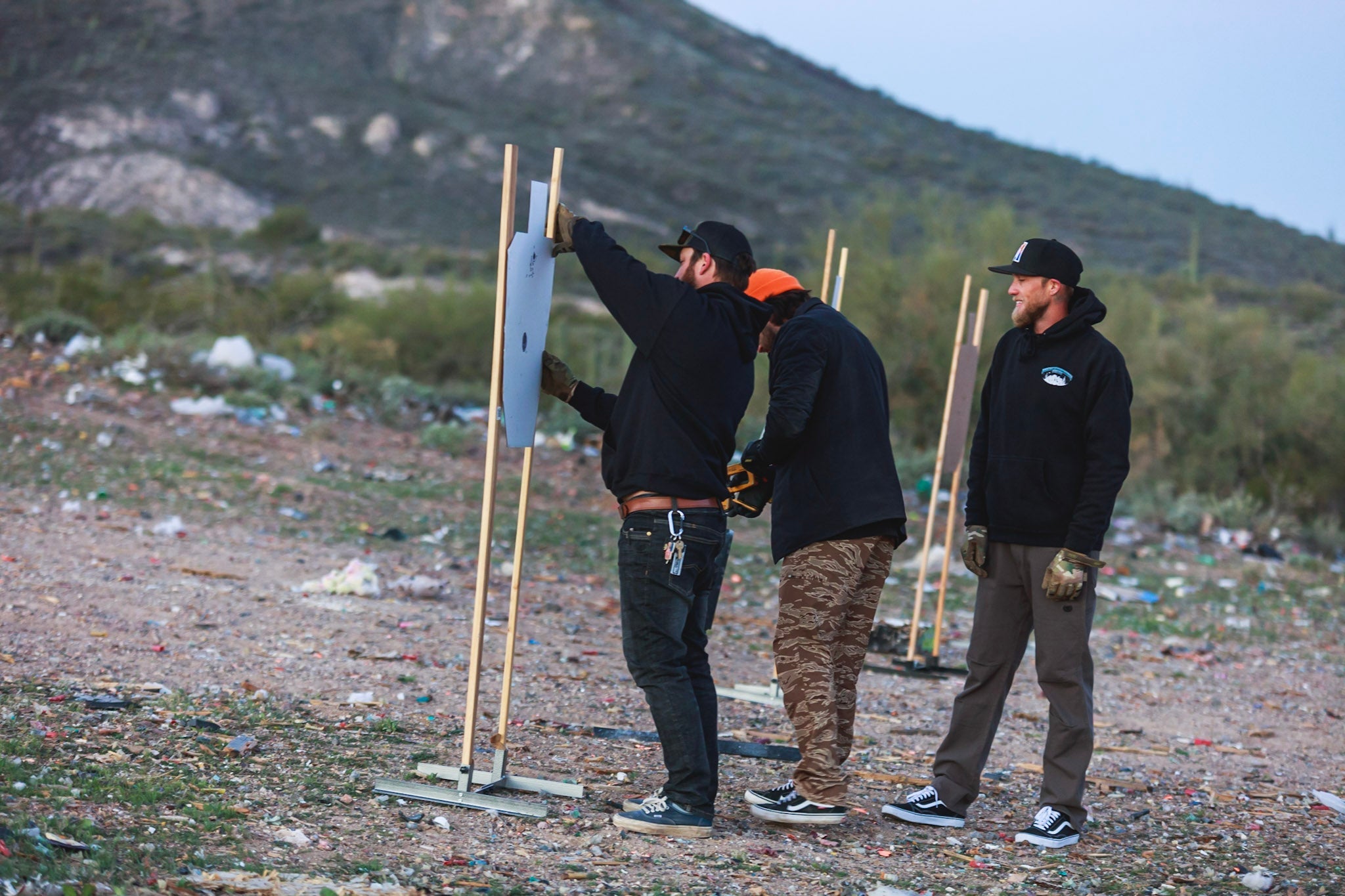 group of men in open field wearing Tactical Distributor pants
