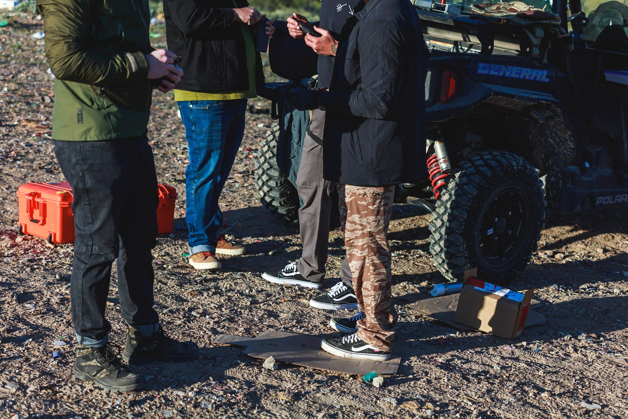 group of people wearing various pants, Vans, and Viktos boots