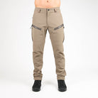 Man wearing field pants in Flat Dark Earth tan color from MTHD's Basin Tweave Durastretch line
