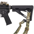 Ferro Concepts D Loop QD Swivel attached to rifle stock QD socket showing Slingster compatible rear sling mounting configuration