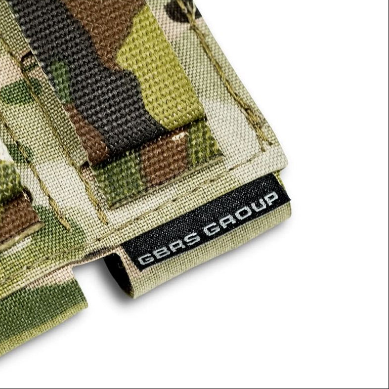 Close up of the GBRS Group tag on the Multicam Double Pistol Magazine Pouch, showing the stitched branding, rugged Squadron laminate material, and precision construction designed for professional tactical use.