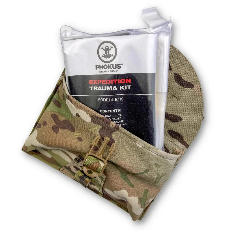 GBRS Group IFAS Individual First Aid System Pouch shown loaded with medical kit insert inside stretch pocket demonstrating fit and internal capacity medical supplies sold separately