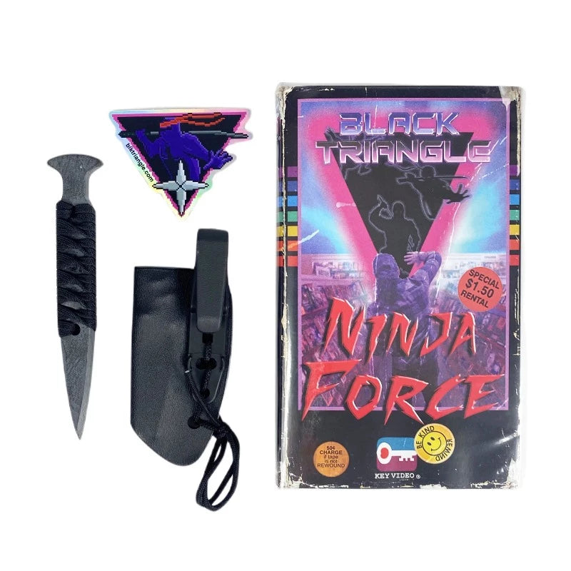 Black Triangle Midnight Creeper MK5 Mod 3 non metallic G10 blade with taco style sheath, VHS case packaging, and holographic sticker