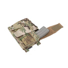 Spiritus Systems Pangolin Flap wrapped around stored equipment, showing how the laser-cut scrim material conforms to gear for improved retention.