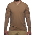 Product shot of the Velocity Systems BOSS Rugby Long Sleeve Tactical Range Shirt in Coyote Brown, a lightweight long sleeve combat top built for performance, breathability, and durability. Made in the USA with a 4-way stretch nylon-spandex blend, UV protection, and Odorexx™ antimicrobial tech, this law enforcement and military base layer is ideal for range training, hot-weather operations, and professional duty use.