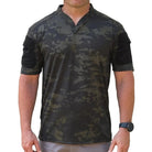 ront view of the Velocity Systems BOSS Rugby Short Sleeve Combat Shirt in MultiCam Black, a USA-made tactical range top with 4-way stretch nylon-spandex, UV protection, and antimicrobial tech. Ideal for law enforcement, training, and field use.