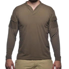 Product shot of the Velocity Systems BOSS Rugby Long Sleeve Combat Shirt in Ranger Green, a professional-grade tactical base layer engineered for law enforcement, military, and range use. Made in the USA with durable 4-way stretch nylon-spandex, this long sleeve operator shirt delivers elite mobility, moisture wicking, and UV protection for hot-weather missions and high-output training. Featuring dual sleeve pockets, Odorexx™ antimicrobial tech, and a low-profile collar designed for plate carriers, the BOSS