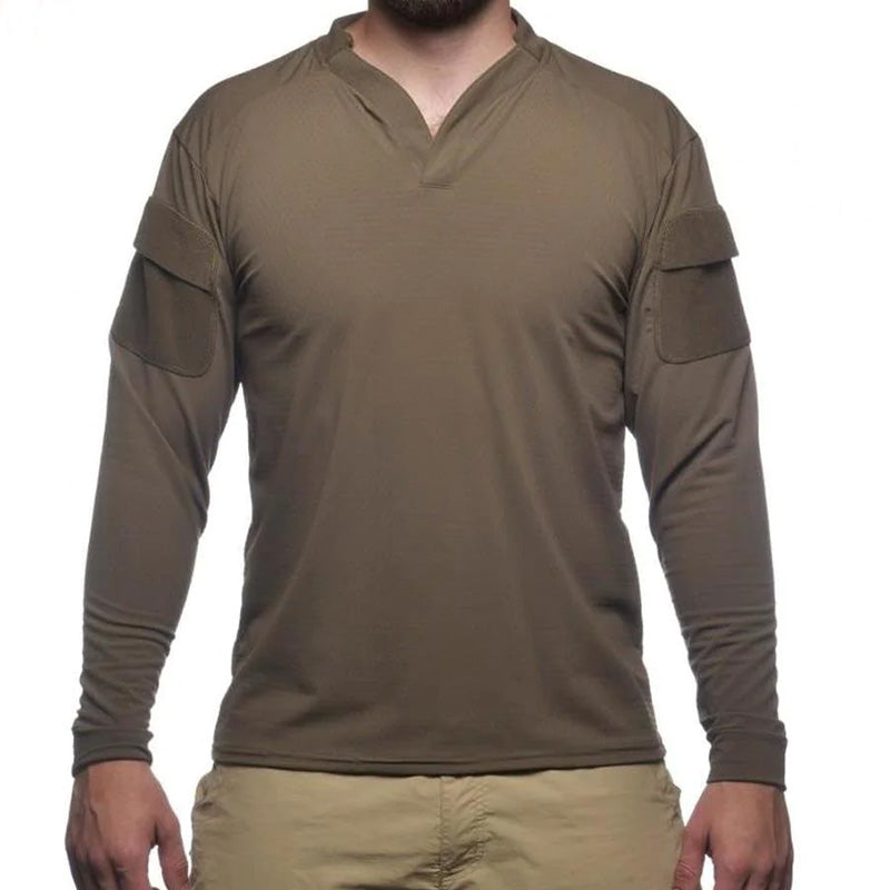 Product shot of the Velocity Systems BOSS Rugby Long Sleeve Combat Shirt in Ranger Green, a professional-grade tactical base layer engineered for law enforcement, military, and range use. Made in the USA with durable 4-way stretch nylon-spandex, this long sleeve operator shirt delivers elite mobility, moisture wicking, and UV protection for hot-weather missions and high-output training. Featuring dual sleeve pockets, Odorexx™ antimicrobial tech, and a low-profile collar designed for plate carriers, the BOSS