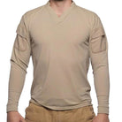 Product shot of the Velocity Systems BOSS Rugby Long Sleeve Combat Shirt in Tan, a professional tactical range top built for mobility, moisture control, and all-day performance. Designed for law enforcement, military operators, and firearms instructors, this long sleeve tactical shirt functions as a lightweight base layer under armor or as a standalone range shirt. Made in the USA with 4-way stretch nylon-spandex, UV protection, Odorexx™ antimicrobial tech, and reinforced sleeve pockets, the BOSS Rugby deli